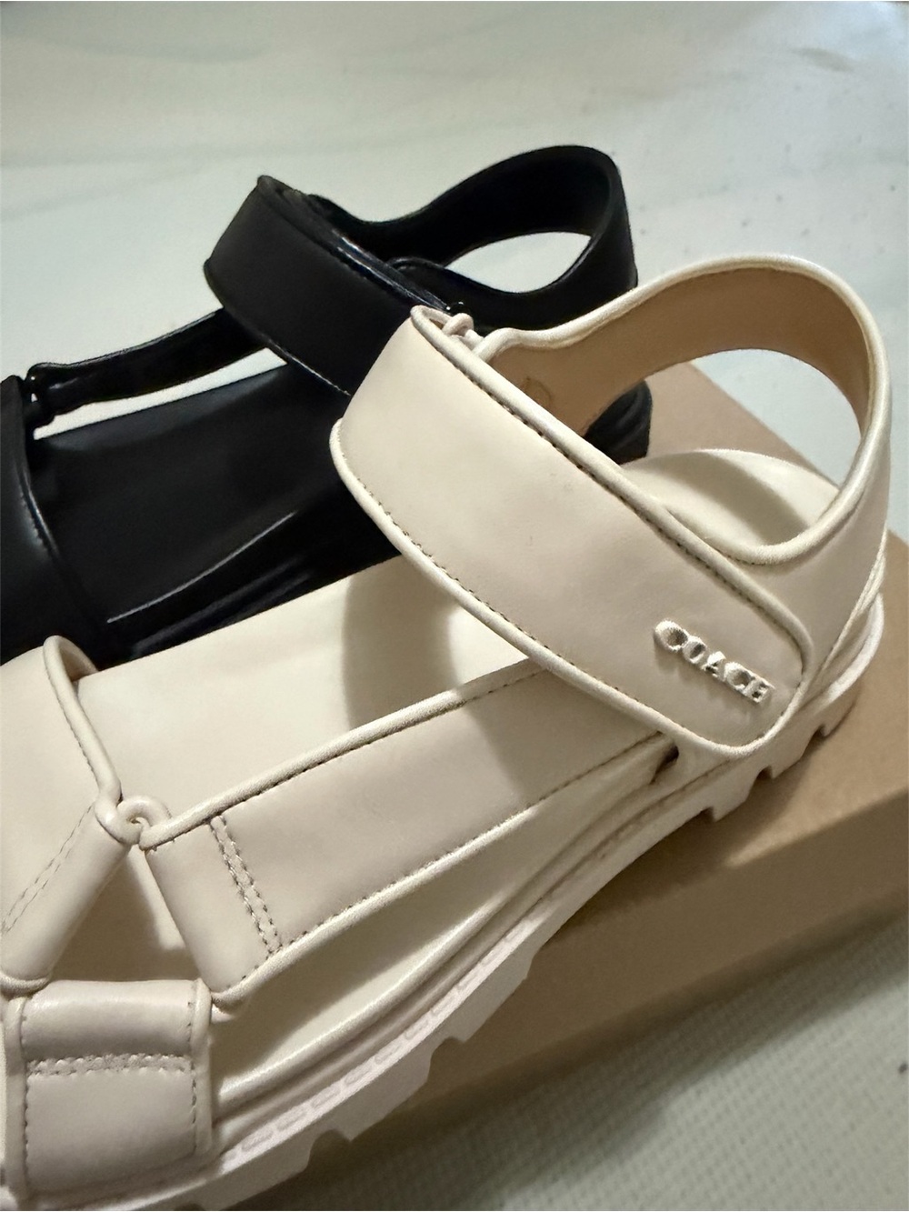 Coach Two-Tone Leather Hook-and-Loop Sandals in Cream and Black